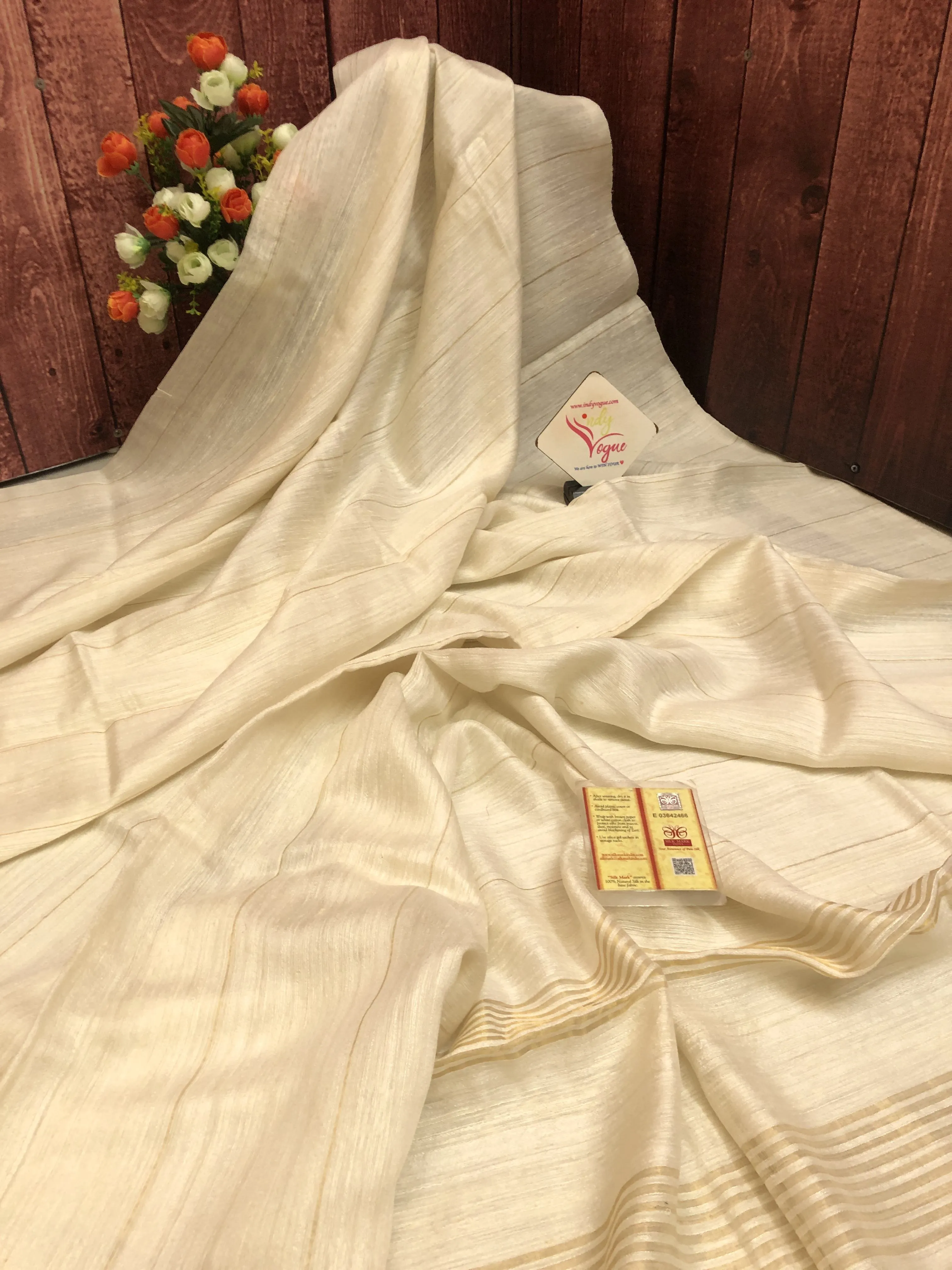 Offwhite Color Pure Matka Silk Saree with Zari Stripes Work